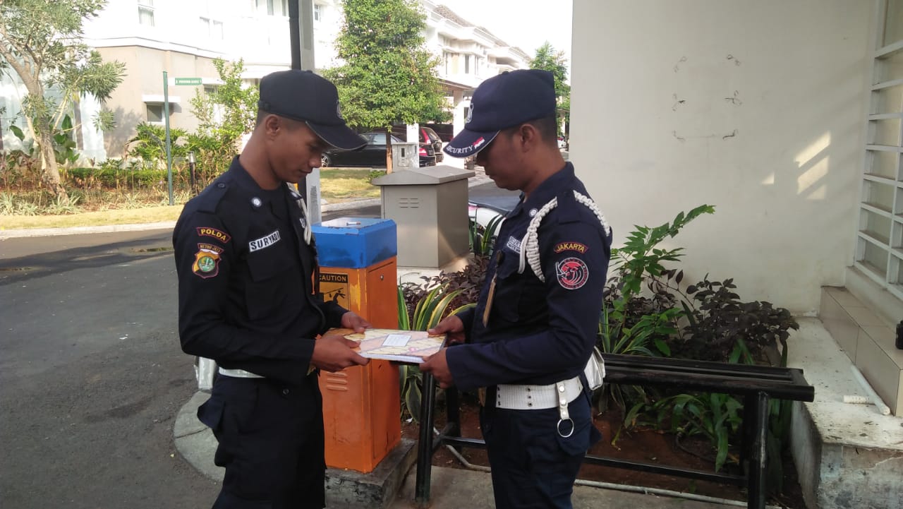 SAGAS security guards handling documentation during duty at a client location