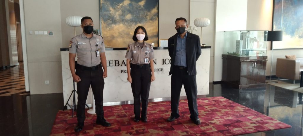 SAGAS security supervisor and guards in the main lobby of a residential or hospitality facility