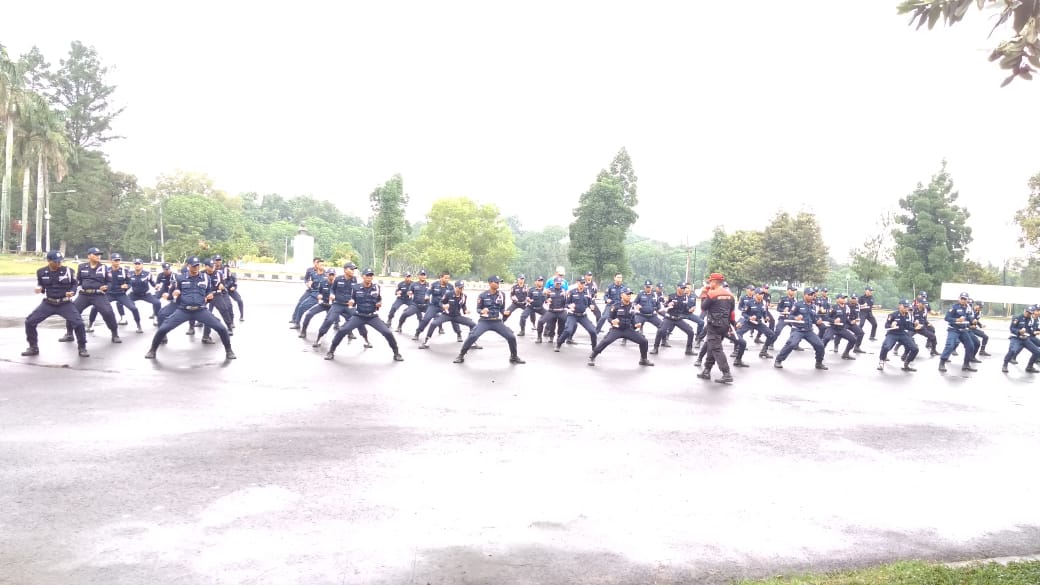 SAGAS security guards conducting field training exercises in an open area