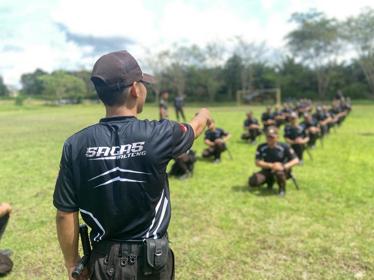 SAGAS security guards receiving field training from instructor at client site in Indonesia to enhance operational readiness and skills