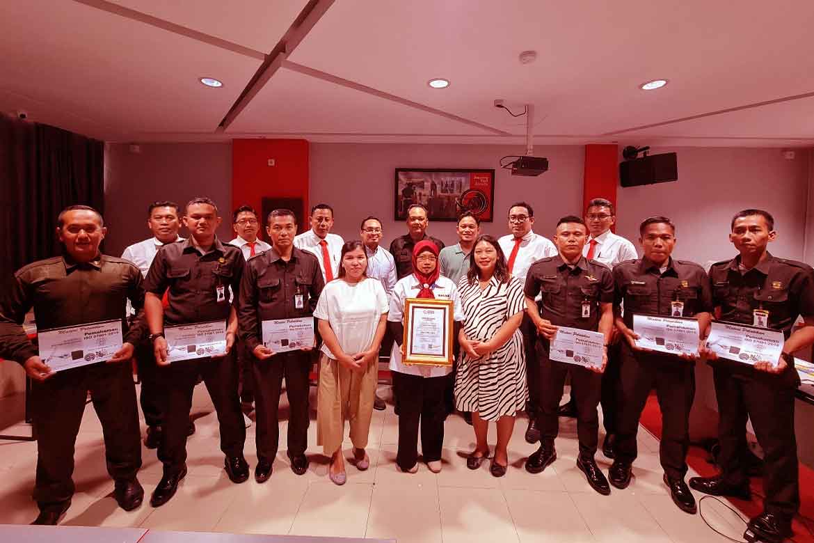 SAGAS management and staff at headquarters during ISO certification achievement in Indonesia