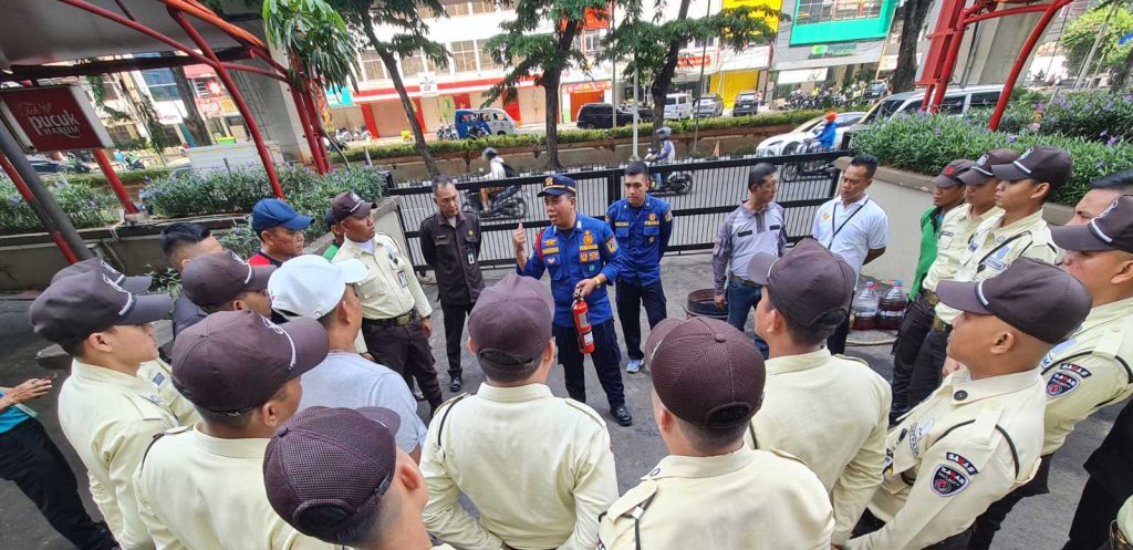 sagas security guards and indonesia fire department instructors during a fire drill at a client site