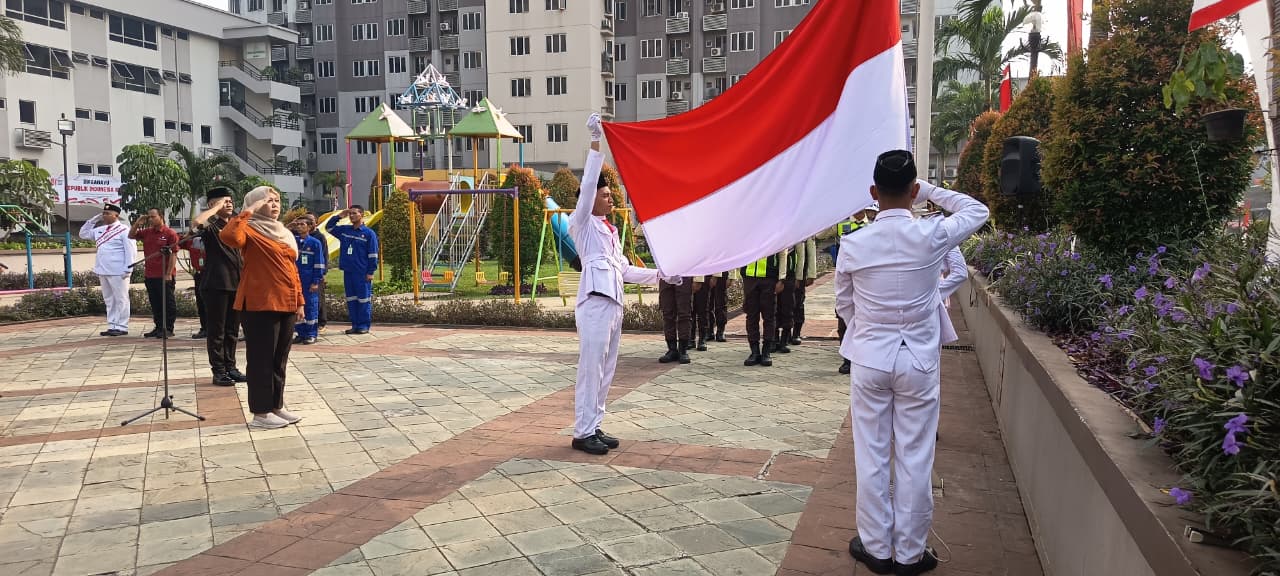 Indonesian flag ceremony during an Independence Day event attended by SAGAS security personnel and client representatives