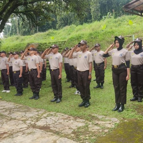 SAGAS security guards performing disciplined roll call salute during training in Indonesia